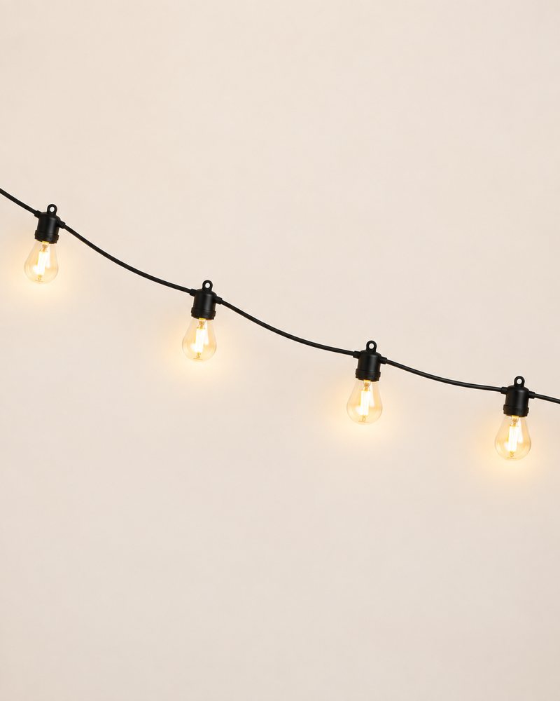 Original illustration of warm outdoor string lights; see the GHUSTAR listing for exact product details